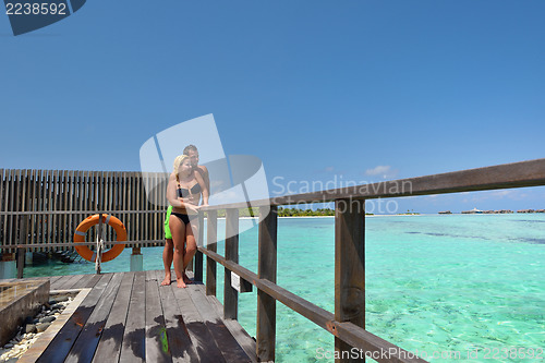 Image of happy young  couple at summer vacation have fun and relax at bea