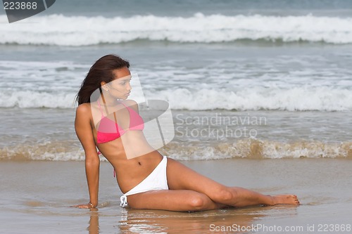 Image of model in pink bikini