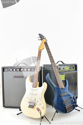 Image of guitars and amplifiers