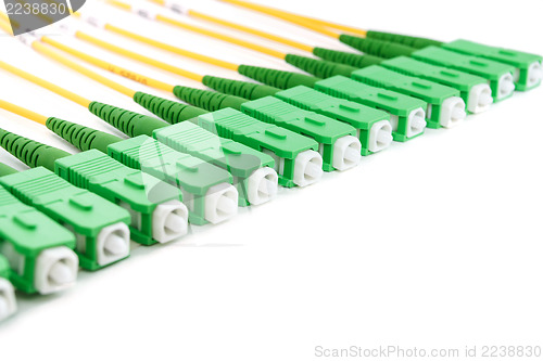 Image of green fiber optic SC connectors