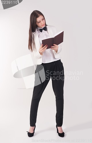 Image of portrait of a business woman with organizer