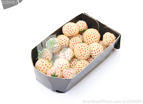 Image of White strawberries in paper box