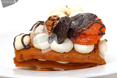 Image of Piece of sweet cake on plate, closeup