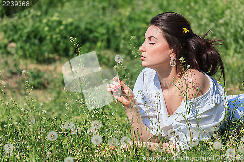 Image of Girl with dandelion