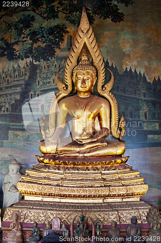 Image of Gilded figure of Buddha in the temple. Indonesia