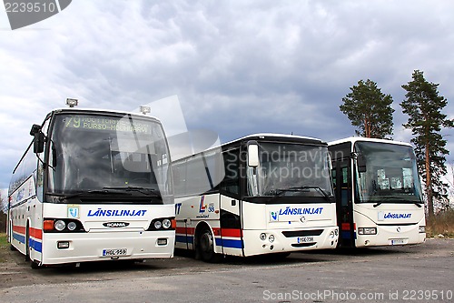 Image of Three Buses Parked