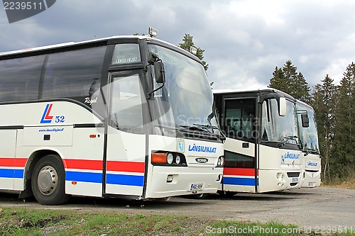 Image of Three Buses Parked
