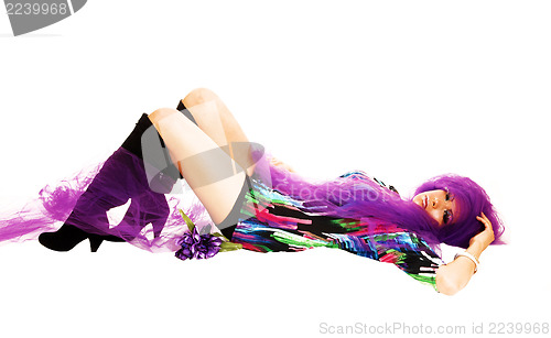 Image of Girl lying on floor.