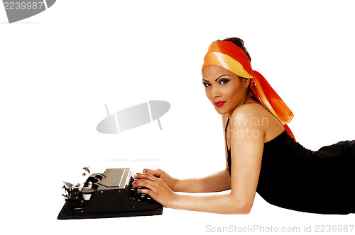 Image of Woman with typewriter.