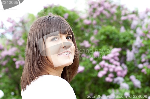 Image of woman in the lilac park
