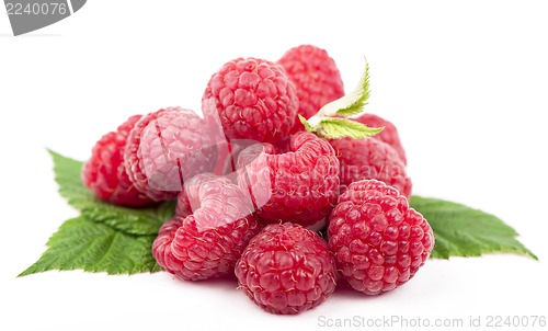 Image of Ripe raspberry with green leaf