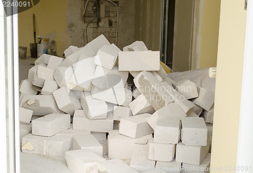 Image of big stack of white building bricks  