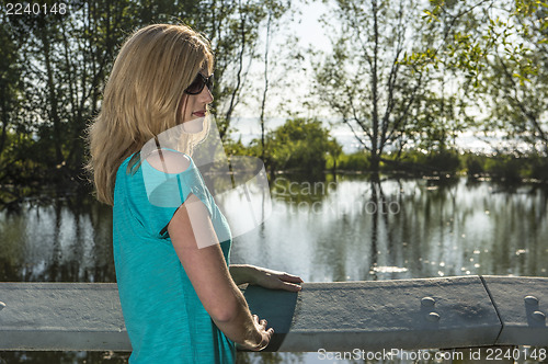 Image of Woman wearing sunglasses