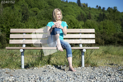 Image of Woman on bench