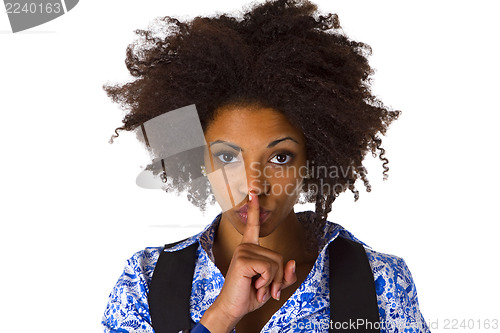 Image of Young afro american saying shhh