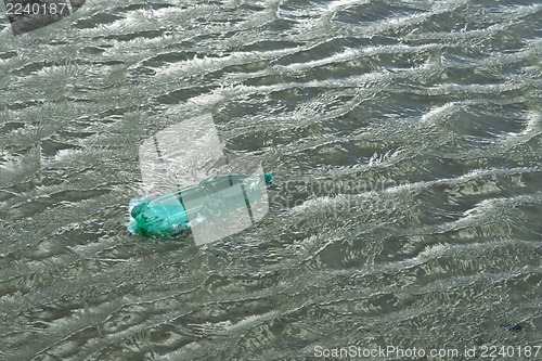 Image of floating green bottle