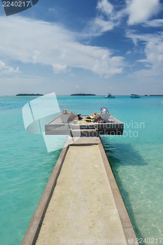 Image of happy young couple have fun on beach