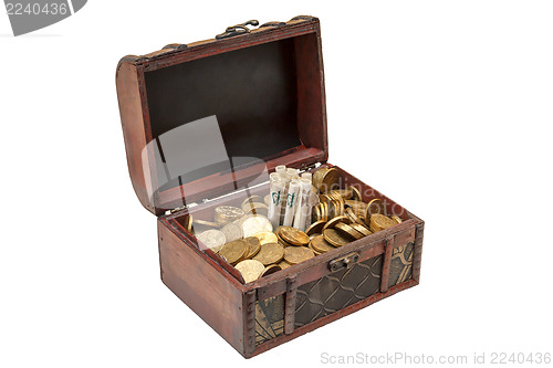 Image of Old wooden chest with golden coins isolated on white background 