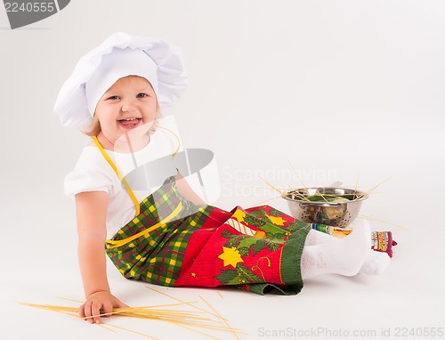 Image of baby girl in the cook hat