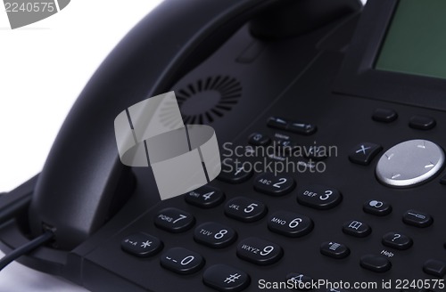 Image of dark detail of modern telephone