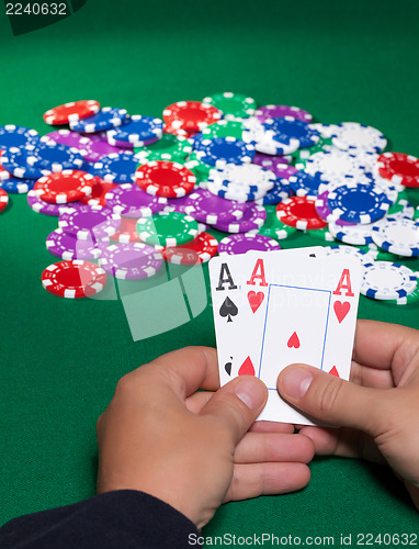 Image of Colorful poker chips and two Ace