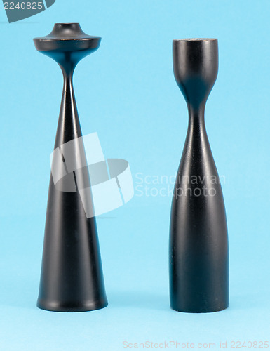 Image of retro curvy wooden candle sticks paint black blue 