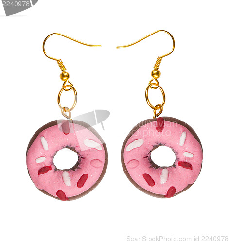 Image of Earrings made of plastic  pink cake in the shape of a ring. coll