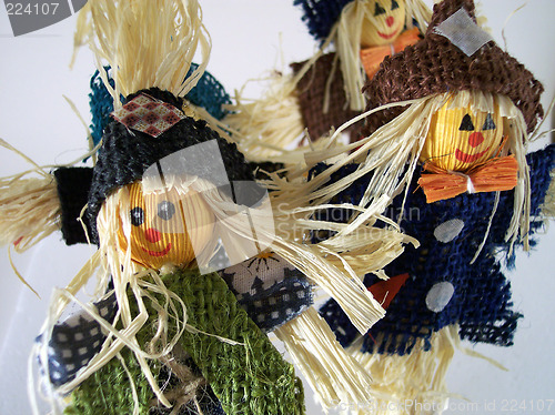 Image of doll scarecrows