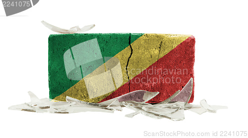 Image of Brick with broken glass, violence concept