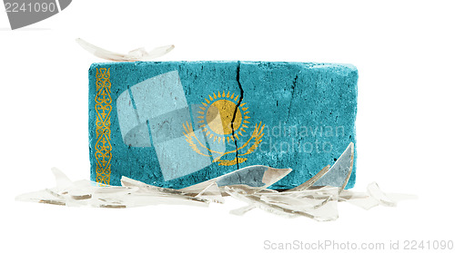 Image of Brick with broken glass, violence concept