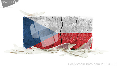 Image of Brick with broken glass, violence concept