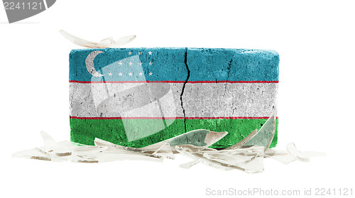 Image of Brick with broken glass, violence concept