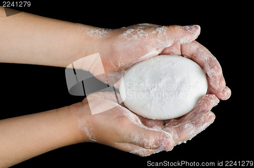 Image of Lathered hands and soap