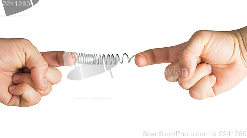 Image of Stretched spring. Resistance and opposition metaphor