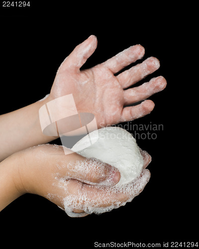 Image of Lathered hands and soap