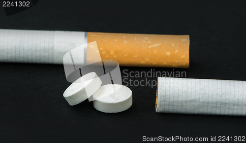 Image of Cigarette, tobacco and pills