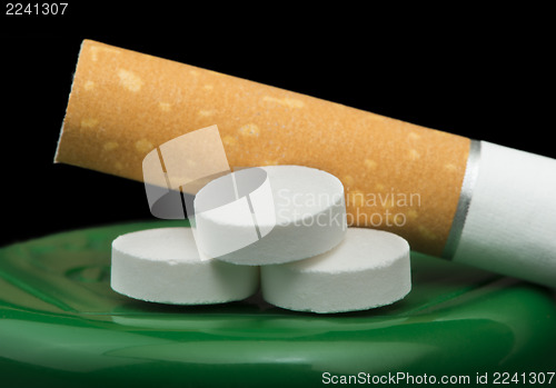 Image of Cigarette, tobacco and pills