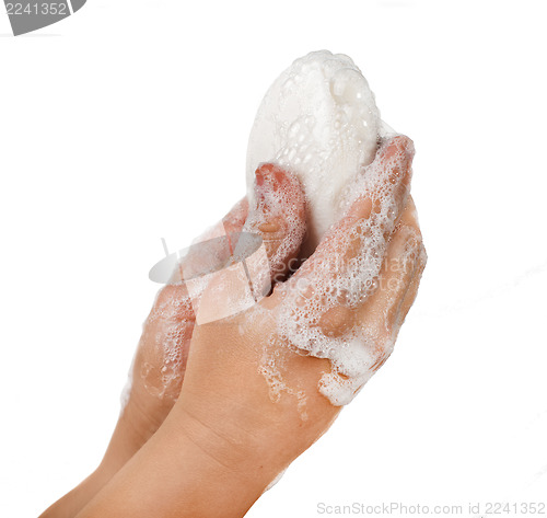 Image of Lathered hands and soap