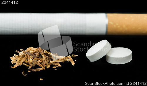 Image of Cigarette, tobacco and pills