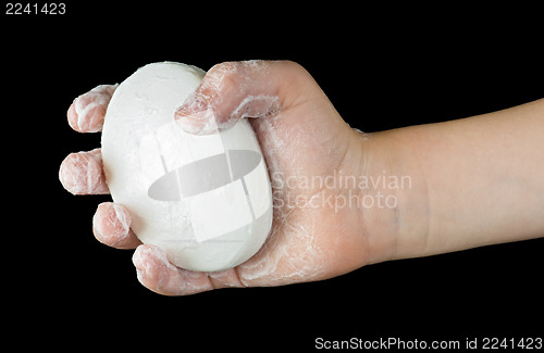 Image of Lathered hands and soap