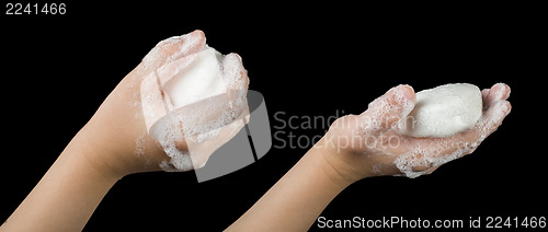 Image of Lathered hands and soap