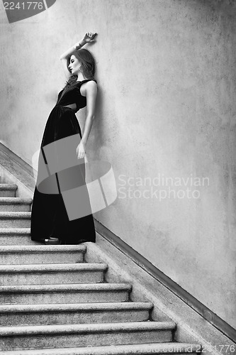 Image of beautiful woman in long dress fashion outdoor
