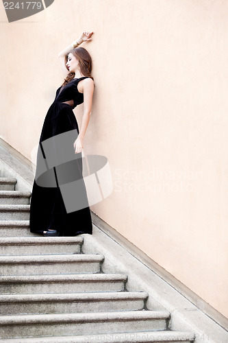 Image of beautiful woman in long dress fashion outdoor