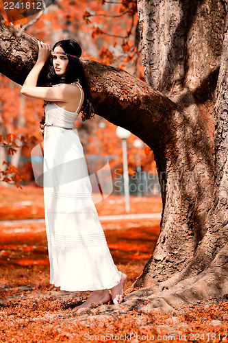 Image of beautiful young brunette woman outdoor 