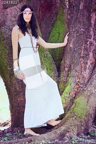 Image of beautiful young brunette woman outdoor 