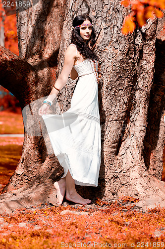 Image of beautiful young brunette woman outdoor 