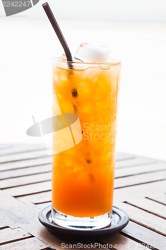 Image of Full glass of fresh iced orange juice