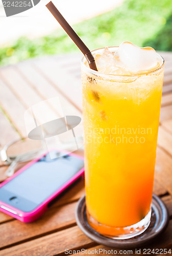 Image of Summer fresh time with orange juice and straw