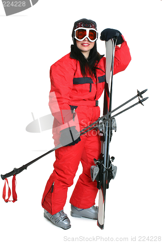 Image of Female skier in red ski suit