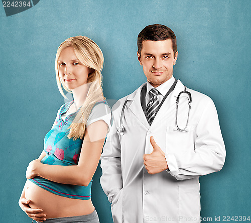 Image of Pregnant Woman With Doctor